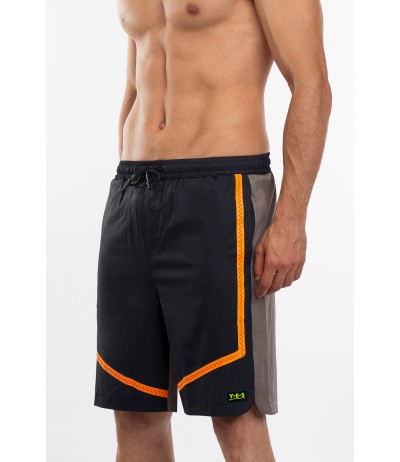 Boxer lunghezza surf in tessuto water resistant con cuciture termosaldate in colore fluo Yes.